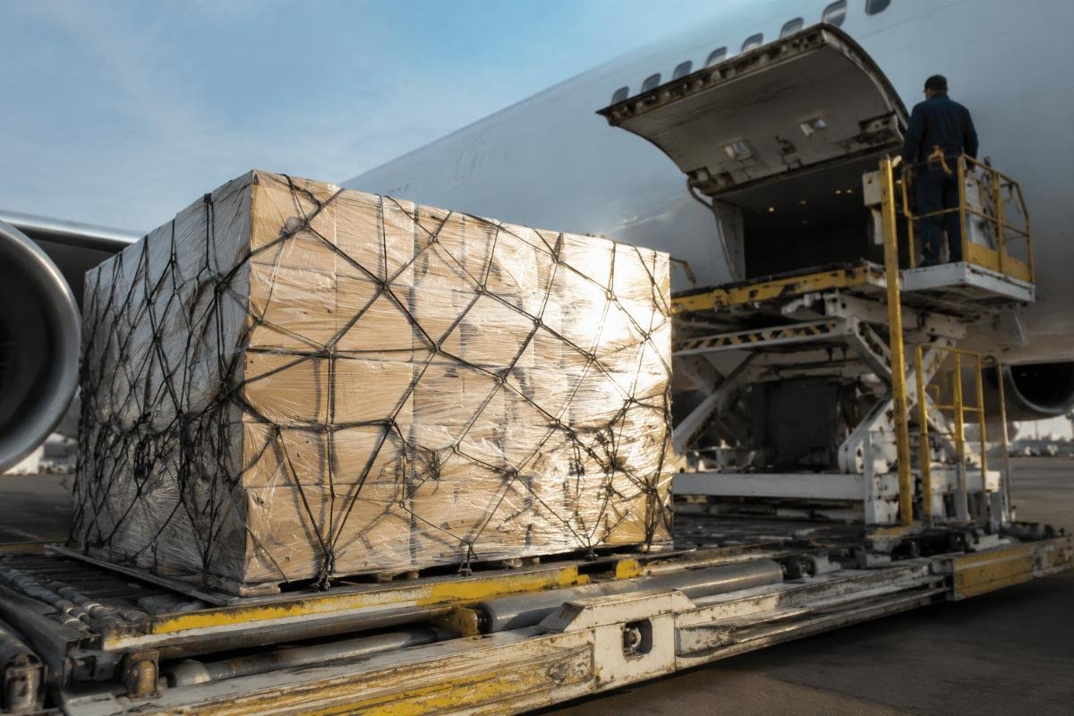 Fast international shipping for excavator thermostat orders A package of excavator thermostats being loaded onto an air freight cargo pallet